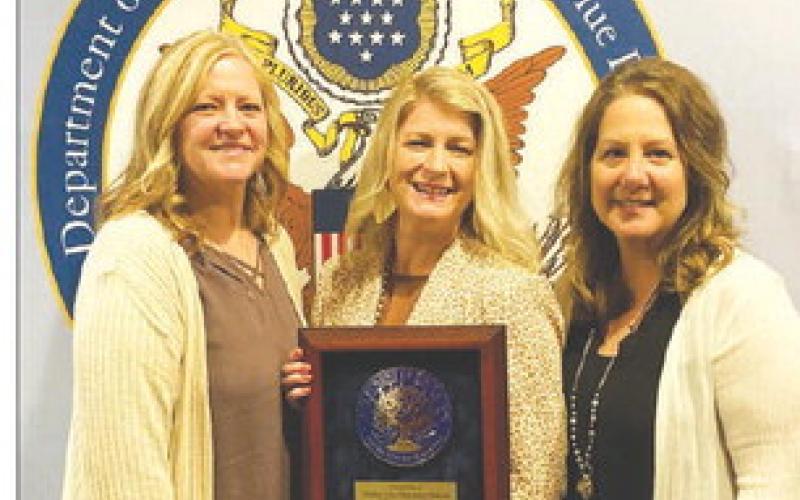 Accepting the National Blue Ribbon Schools award in Washington, DC were (L-R) teacher Carla Sandquist, Principal Danae Paxton, and teacher Nancy Enright, representing Timber Lake Elementary School.