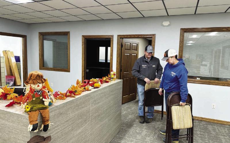 Rusty Gebhardt recruited his school teacher wife Shanna to help with the move into the recently-completed new Western Dakota Bank building last weekend. Employees and volunteers worked through the weekend for the opening on Monday, October 16. A grand opening will be announced later.