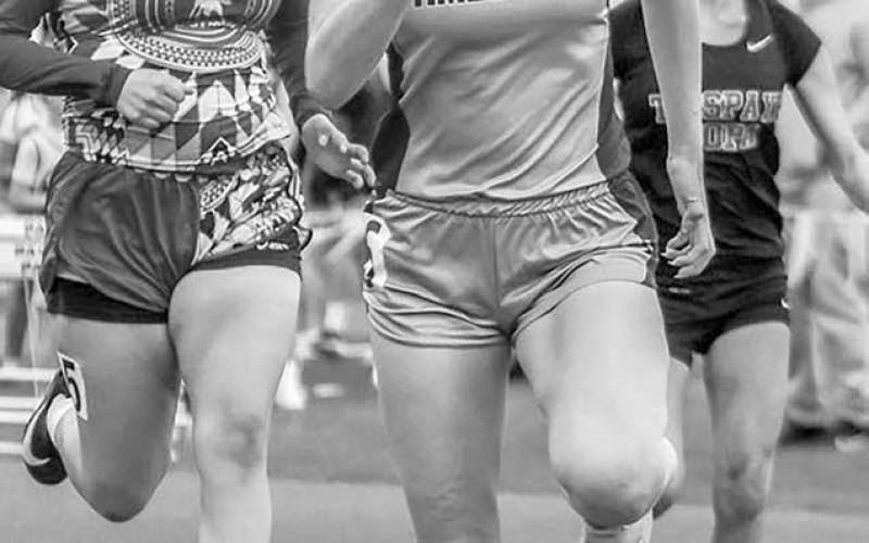 Above, Autym Red Bear and Kiya Mowrer power down the track for the Timber Lake Lady Panthers during the Timber Lake Track Invitational last Thursday. At left, Miley Murray competes in the JV sprints. The Timber Lake track teams were in Eureka on Tuesday, May 6, with the JV squad heading to Onida on Thursday, May 8, for the Sully Buttes JV Invitational.