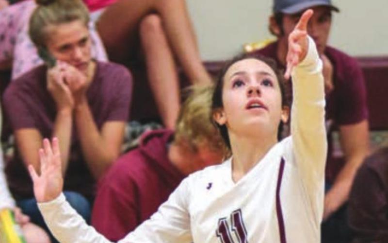 Rachel Toviah serves to the opposing team.