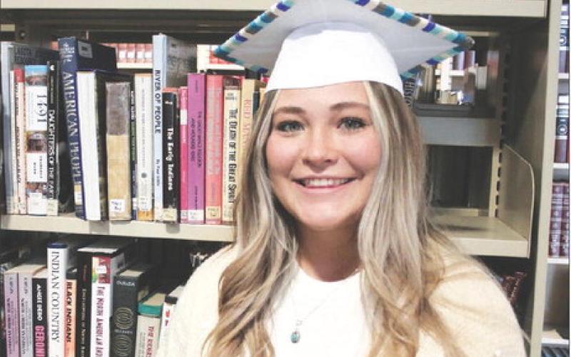Through the dual-credit program, Timber Lake HS senior Kenna Webb earned enough credits to begin college this fall as a sophomore. Through on-line courses the future teacher garnered 37 dual-credits, the most by a Timber Lake student since the program began. Photo by Jon Flatland