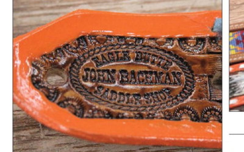 John Bachman’s creations at the Eagle Butte Saddle Shop include custom-designed, hand-tooled leather belts and he’s built a large following around his Pow Wow belts. Above, the signature stamp found on a belt by Bachman. Photos by Jon Flatland