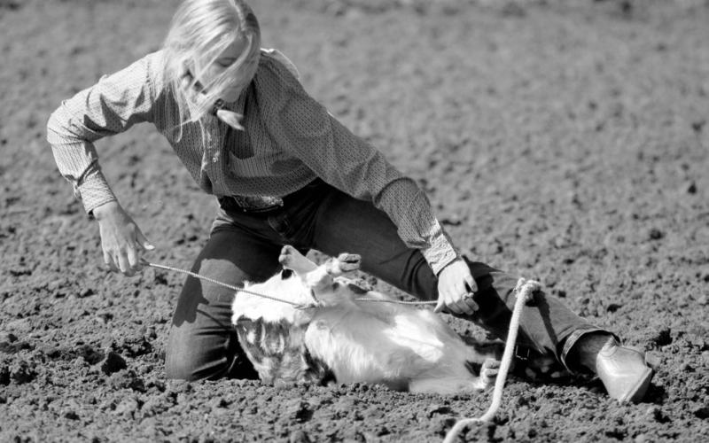 Lainee Gebhart of Meadow competes in the goat-tying competition at the Dewey County 4-H Rodeo in Timber Lake on Sunday, May 28. Photo by Jon Flatland