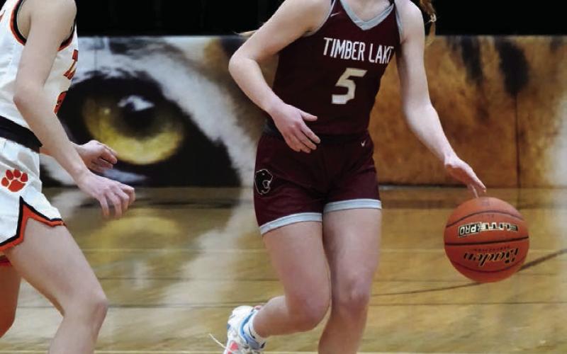 Senior guard Averie Marshall (5) brings the ball into the front-court for the Timber Lake Lady Panthers during recent girls basketball action. The Lady Panthers will play in the Little Moreaeu Conference Tournament this week. The tournament bracket had not been released by the time this issue of the Topic went to press. Photo by Marie DuPreez