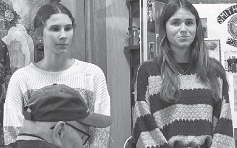 Girl’s State attendees Natalie Lawrence, left, and Meredith Maciejewski, spoke at the Isabel Veteran’s Day Supper on Sunday to relay their experiences at the week-event. Both said they now have a new-found respect for the way government works and the election system. Their attendance at Girl’s State was sponsored by the Isabel American Legion Auxiliary. Also attending Girl’s State but unable to attend the supper was Joie LeBeau.
