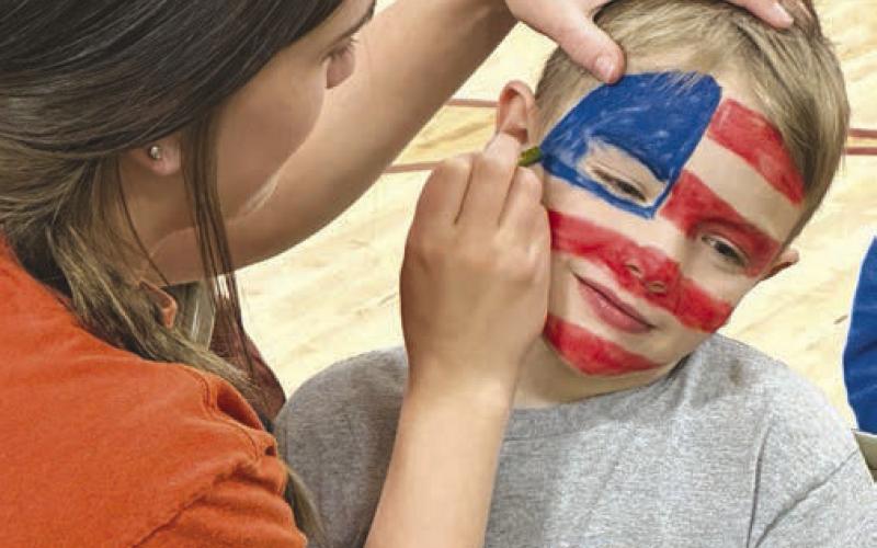 Mckenzi Vomacka and her brother, Keaton Jones, at the face painting booth.