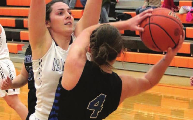 Timber Lake senior Maci Maher’s defense has a South Border player all locked up during their game at the Mobridge Rotary Classic. Photo by Jon Flatland