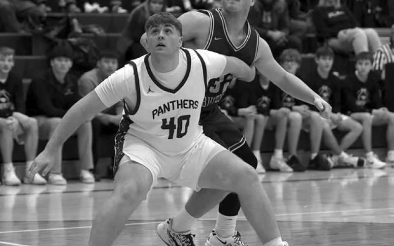 Sophomore Mason Bickel (40) boxes out a Sully Buttes player while watching for a rebound during Timber Lake’s win over the No. 4 ranked Chargers. Topic Photo/Marie DuPreez