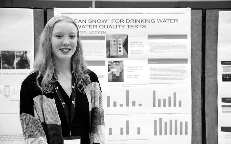 Kendyl Locken with her project at the High Plains Regional Science Fair.