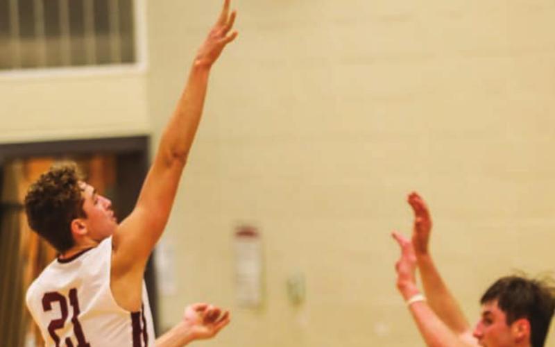 TLHS’s Kedrick Martin puts up a shot in the second half.