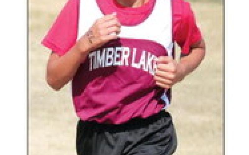 Medalist Xavier Sanchez led the Timber Lake JV boys to the team title at the Philip Cross Country Invitational on Saturday, Oct. 8.