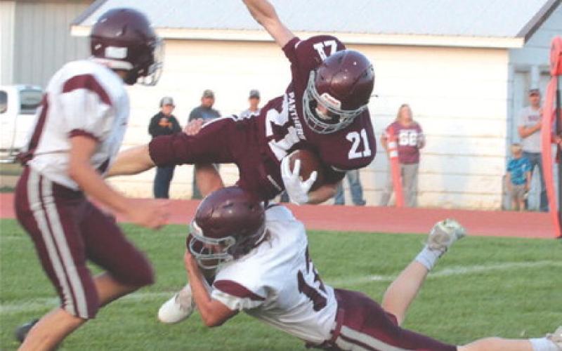 Timber Lake junior defensive back Eddie Keller (21) gets upended by a Newell defender while returning an interception in the second quarter of the Panthers’ 52-0 win over the Irrigators at Kraft Field last Friday, Sept. 1. Timber Lake, 2-1 overall, hosts the 1-2 Dupree Tigers this Friday, Sept. 8, with kickoff at 6 p.m. The Tigers are coming off a 40-0 loss to unbeaten Stanley County. Photo by Jon Flatland