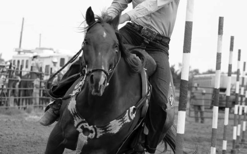 Riley Glines of McIntosh leads her horse through the poles at the 64th annual Ziebach County 4-H Rodeo in Dupree on Saturday, July 13. Glines captured top honors in the Senior Girls Poles event with a time of 22.047. Photo by Jon Flatland