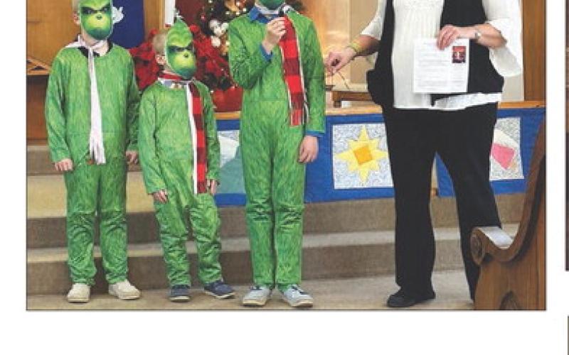 The Zeug brothers (Eli, Andrew and Isaac) took the message “Jesus is not a Grinch” to the Timber Lake Christmas parade and won first place for United Parish Church. They appeared briefly with Vicar Teri Gayer at church on Sunday.