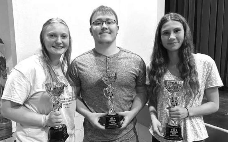 ABOVE: Talley Locken was the only sophomore to earn top scholar honors. TOP RIGHT: Junior class top scholars (l-r) Emma Johnston, Geana Bollinger, and Hailey Roggow. RIGHT: Senior top scholars (l-r) Jordan Jones, Gabe Keller, and Natalie Lawrence.