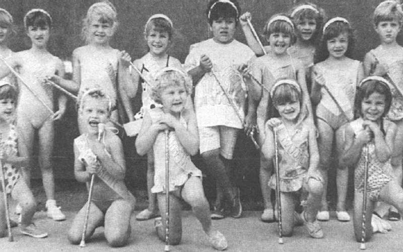 The Timber Lake Majorettes have been practicing for the Days of 1910 parade. Pictured are FRONT (L-R): Alicia Schweitzer, Becky Goldade, Suzanne Goldade, Jamie Maher, Heaven Winterberg; BACK: Theresa Crance, Ikea Pfeifle, Ashley Dahlgren, Erin Linderman, Jenna Holzer, Vicki Linderman, Carmen Maher, Jennifer Wimmer, Heather Schmidt. NOT PICTURED: Holly Maher and Shawana Winterberg. (Timber Lake Topic, July 11, 1991)