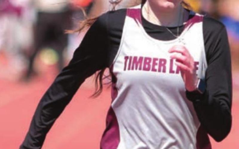 Sarah Holzer runs down the track.