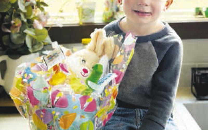 The Easter bunny (Isaac Zeug) presented Easter baskets to winners of the prize drawings at the annual Dewey County 4-H Easter Egg Hunt on Saturday, April 11. L-R are Shiloh Smith, Lakyn Lindskov, Cade Linderman, Ryder Spiel and Emelia Castaneda (with her mom, Micaela). Jon Booth (below) was not present for the group photo.