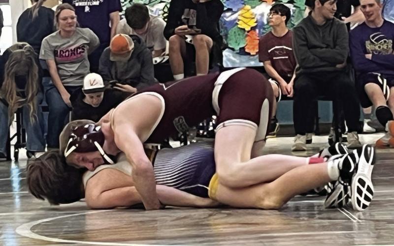 Timber Lake’s Taggen Paxton rides his opponent in a match at the Harding County Wrestling Invitational on Dec. 30. Paxton was 9-8 heading into the tournament and split four matches, moving to 11-10 on the season. Photo by Denise Perryman