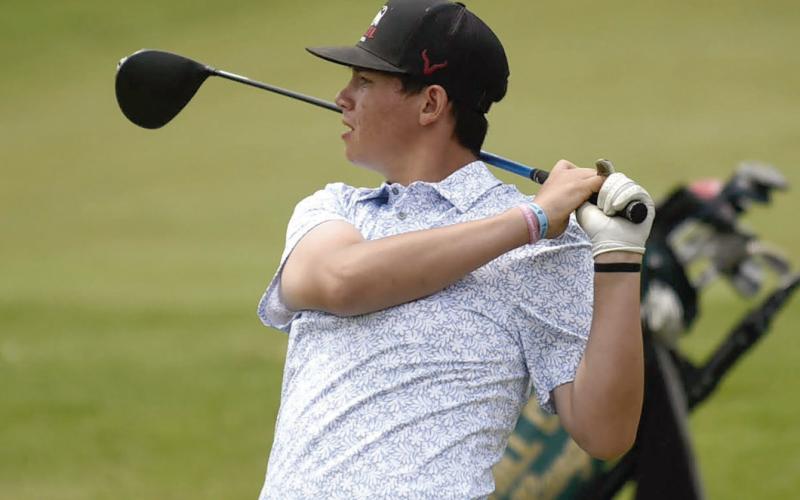 Timber Lake’s Hadley Thompson follows a shot at the South Dakota Class B Golf Tournament in Rapid City last week. He finished 20th overall and his brother, Hayden, placed 25th. Photo by Ryan Deal, 605 Sports
