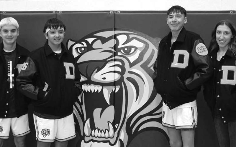These students are this year’s Dupree High School juniors that earned their letterman jackets through the 3-2-1 DHS Booster Club program. To earn a 3-2-1 program jacket, a student must be in 3 sports at DHS for the first 2 years of high school at Dupree School and this must be done by the 1 student. (L-R): Spencer Olsen, Jeremiah Tiger, Talyn Ley, and Minda Woodward. Photo by Patty Peacock