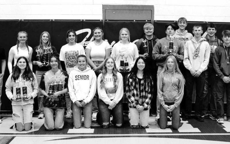 These students represented Timber Lake High School at the NWAS Academic Olympics on April 12. FRONT (LR): Meredith Maciejewski, Natalie Gross, Carlie Lawrence, Emma Johnston, Amanda Red Bear, Talley Locken; BACK: Gabe Keller, Jordan Jones, Averie Marshall, Mckenzi Vomacka, Kenna Webb, Hailey Roggow, Shawn Quinn, Francesco Barbini, Kyler Bollinger, Holden Gill, Carter Keller, Jeff Angsman, and Gracen Hansen. Photo by Patty Peacock