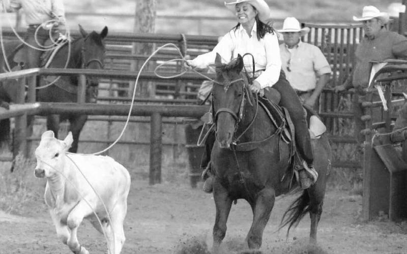 Kashlin Bettelyoun of Eagle Butte grimaces as she watches her rope slip off the head of a calf during ladies breakaway roping action at the Faith Stock Show and Rodeo last weekend. Photo by Jon Flatland
