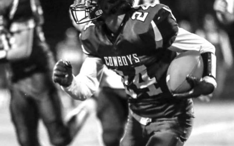 Lemmon senior Jacob Hetzel runs with the ball during 9-man football play this past season. File photos by Robert Slocum