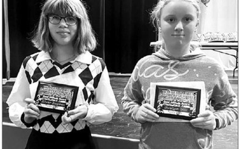 Eighth grader River Boysen and sixth grader Evelyn Gill received the “Good Attitude” awards for Middle School Band from teacher Julie Barnica.