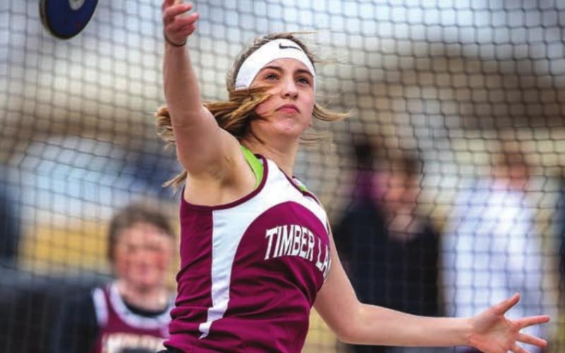 Mckenzi Vomacka launches a discus in junior high track meet action. The TL JH girls won the conference meet. Photos by Robert Slocum