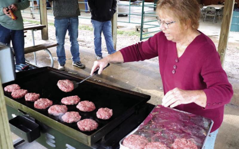 Marcia Maher of Isabel Future Visions manned the grill during Isabel’s July 4th Community Potluck. Due to rain the event was moved from the rodeo grounds into the Pavilion.