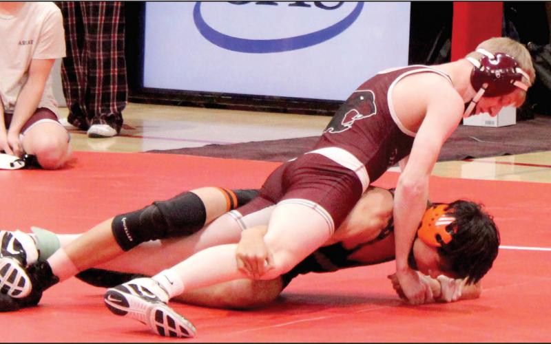 Timber Lake’s Taggen Paxton holds down an opponent while wrestling in the Cheyenne-Eagle Butte-Dupree round-robin meet in C-EB High School last Monday, Feb.2. A sophomore, Paxton earned second place honors in the 120 pound division. Wrestling regionals get underway Friday, Feb. 20, and conclude Saturday, Feb. 21, in Rapid City. Find more sports coverage on Pages 2B-5B Topic Photo/Patty Peacock