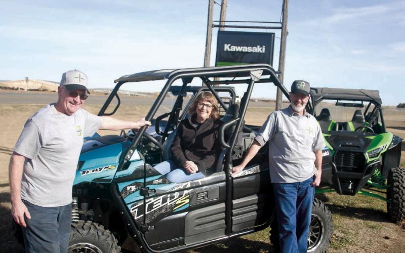 Schmeichel’s Repair in McLaughlin is marking its 50th anniversary as a Kawasaki dealer. Pictured are (l-r) Dan Schmeichel, Pattie Schmeichel and Harvey Schmeichel. Founder Lester Schmeichel became a Kawasaki dealer in 1972 and the dealership remains a mainstay in the region today. Photo by Jon Flatland