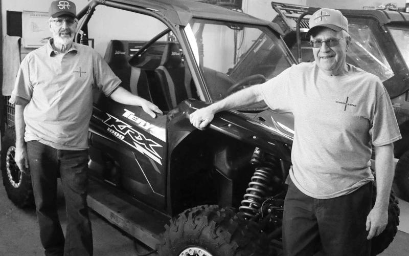 Harvey (left) and Dan (right) Schmeichel, brothers and owners of Schmeichel’s Repair in McLaughlin, will host an open house on Friday, Nov. 4, from 12-7 p.m. to celebrate the 50th anniversary of their father, business founder Lester Schmeichel, becoming one of the nation’s early Kawasaki dealers - an agreement that has helped make Schmeichel’s Repair a mainstay for customers across the region since 1953. Photo by Jon Flatland