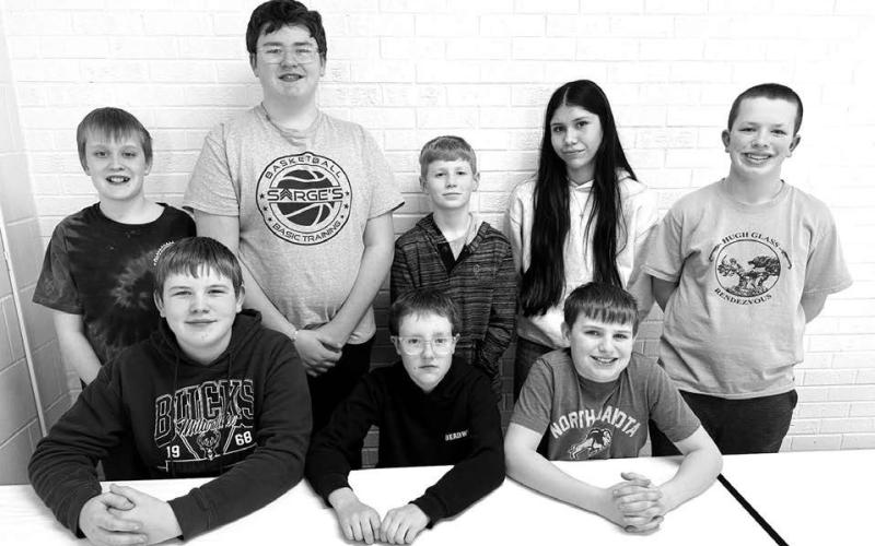 Grades 6–8 FRONT (l-r): Brayden Meier and Greyson Goldade (6th grade top spellers) and Barrett Maciejewski (sixth grade alternate); BACK (l-r): Mason Hollenbeck and Kayne Palmer (7th grade top spellers), Tracyn Paxton (7th grade alternate), Autym Red Bear (8th grade top speller), and Garrett Nilson (8th grade alternate.) NOT PICTURED: Maya Biegler (8th grade top speller).