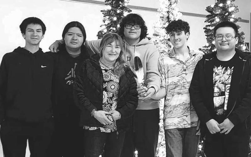 Dupree High School entered the Lakota Language Bowl at the Lakota Nation Invitational in Rapid City before the holiday break for the first time and scored a second place overall finish. Pictured (l-r) are team members Joseph Brewer, Lamont White Feather, Lakota instructor Marion Blue Arm, Zuyala Oakie, Traden Meeks and Neldon Little Wounded. Topic photo by Patty Peacock