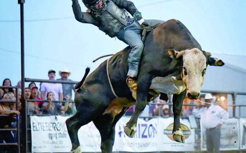 Faith cowboy Zane Day was crowned the 2025 bull riding champion at the Days of 1910 Rodeo in Timber Lake over the weekend with a 78 point ride Saturday night, July 26. Day was the only one of 11 bull riding entries to mark an 8-second-ride. Photo by Chuck Miner
