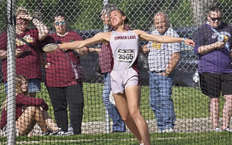 Timber Lake’s Jasmine Nash throws the discus at the South Dakota Class B Track Meet in Sioux Falls last week. Nash, a senior, broke her own school record in the shot put with a throw of 39-07.75 to finish second overall and placed third in the discus with a distance of 122 feet. Photo by Marie DuPreez
