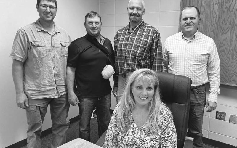 The Timber Lake School Board conducted its annual reorganization meeting on July 16. It was the first meeting with Lori Enright (front) as superintendent. Board members are (l-r) Tyrone Kraft (vice-chairman), Joe Locken, Jake Kraft (chairman), and Bryce Lindskov. Doug Lawrence (not pictured) attended via telephone. Photo by Kathy Nelson