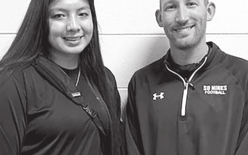 Dupree High School senior McKadyn Chasing Hawk (LEFT) with a personal trainer that works at the South Dakota School of Mines and Technology in Rapid City.