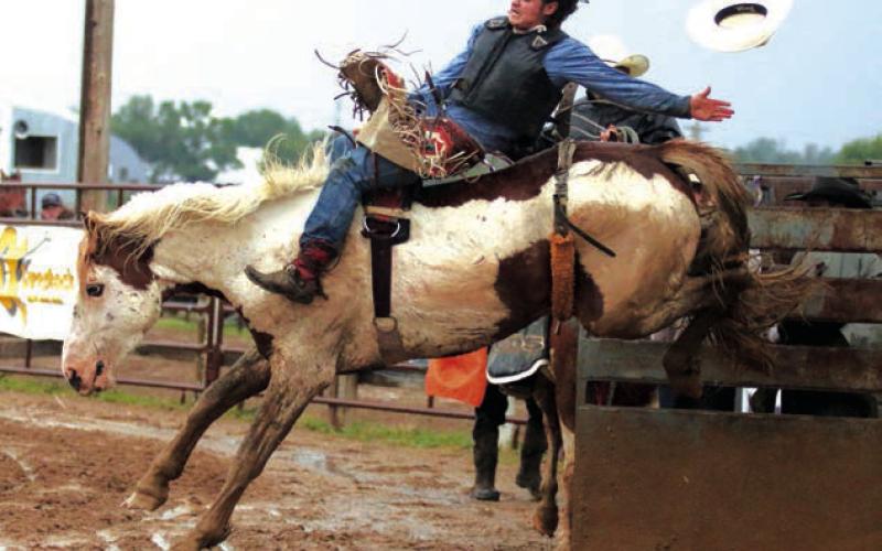 Jhett Knight of Dupree competes in bareback riding during the Dupree Pioneer Days Rodeo in June. Photo by Jon Flatland
