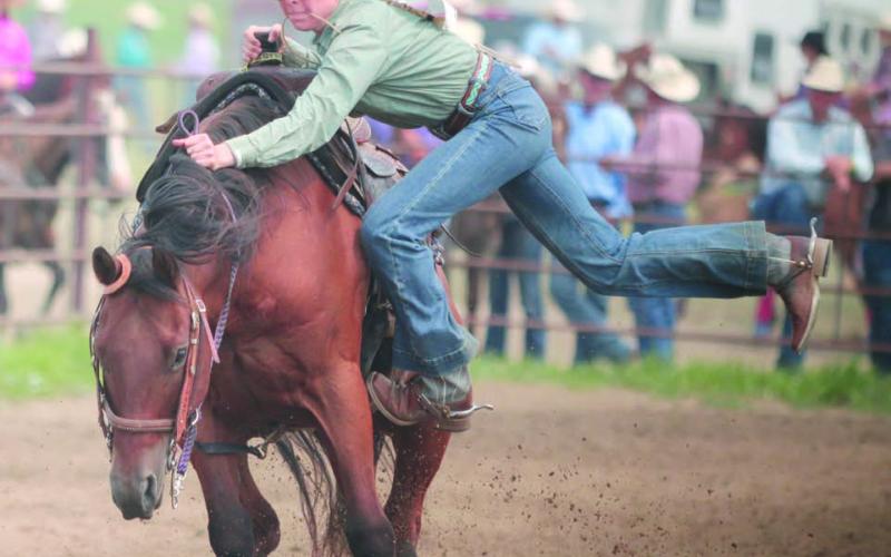 Talley Locken of Isabel was able to avoid a potentially serious spill when her horse bucked as Locken was dismounting during the goat-tying event at the Ziebach County 4-H Rodeo on Saturday, July 15, in Dupree. Photo by Jon Flatland