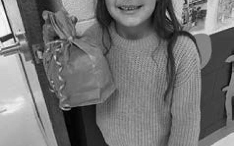 Sophia Ley: Pumpkins are orange and green and maybe other colors. I liked when we painted sacks to look like pumpkins.