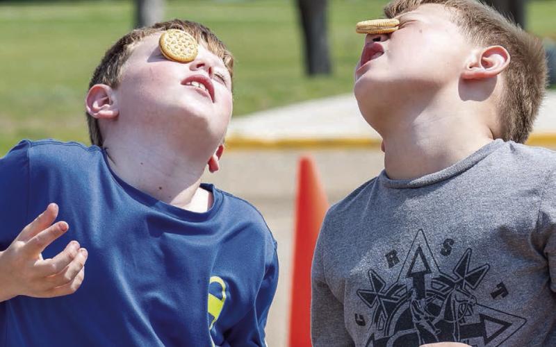 Calder Petersen and Clinton Farlee in the Cookie Face Game.