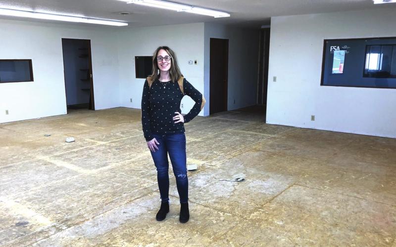 ABOVE: Kasey (Bickel) Maher is eager to start the next phase of renovations in the building she and her husband Patrick recently purchased. It will house her coffee shop and several other small businesses.
