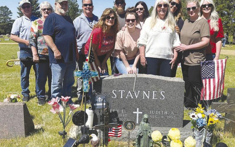 The Stavnes family gathered at the Timber Lake Cemetery where the late Joe Stavnes was recognized with a salute by the American Legion on Memorial Day. Front (l to r): Mark Stavnes, Heidi Stavnes, Jordan Fullmer, Judy (Mrs. Joe) Stavnes, Caitlin Nation; back: Guy Stavnes and his wife Diane, George Stavnes, Ryan Fullmer, Jodi Fullmer, Michele Bullock and Shawn Willson. Joe, Guy, Mark and George are sons of the late Sig and Aileen Stavnes. Photo by Kathy Nelson