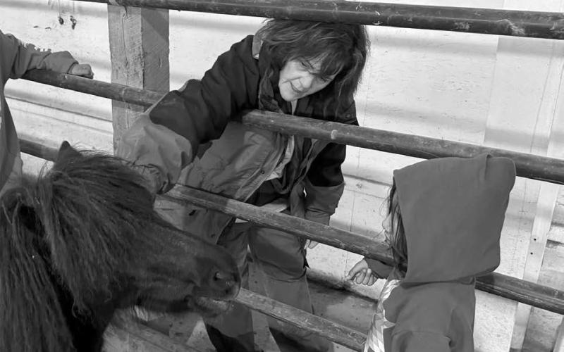 Bridget Williams introduces a child to a horse at Red Horse Healing in Rapid Valley, S.D., on Feb. 21, 2026. Photo by Bart Pfankuch