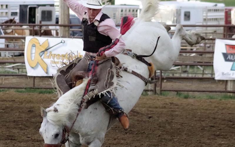 Brandin Jewett of Dupree was among the saddle bronc and bull riders competing in a high school showcase at the Dupree Pioneer Days Rodeo held June 28-29. Photo by Jon Flatland