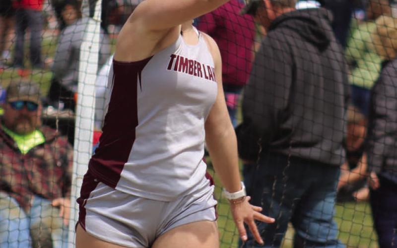 Presley Goldade launches the discus during competition at the Little Moreau Conference Track Meet at Kraft Field in Timber Lake last Thursday, May 9. Goldade, a sophomore, finished fifth overall in the event with a mark of 82-7. Photo by Jon Flatland
