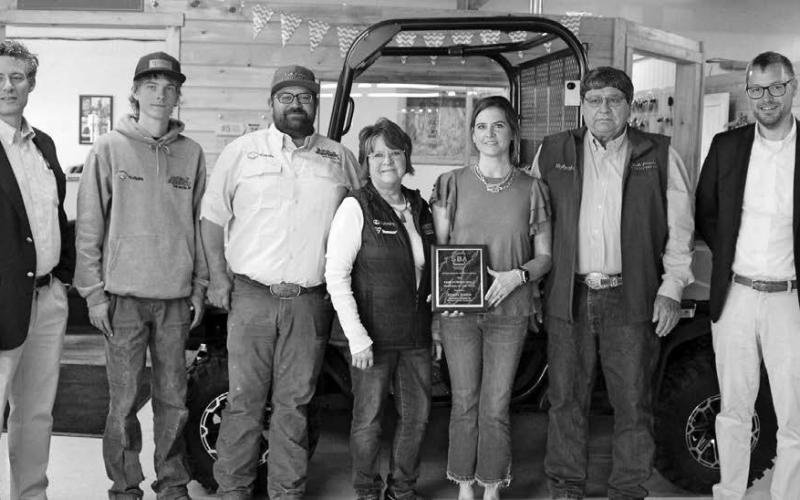 Butte County Equipment was awarded the 2025 Family-Owned Small Business of the Year award from the South Dakota Small Business Administration (SBA). From left: Justin Everett, SBA Regional Administrator, Jadon Jensen, Aaron Lindskov, Margaret Lindskov, Kenita Jensen, Dennis Lindskov and Bryson Patterson, SBA South Dakota District Director.
